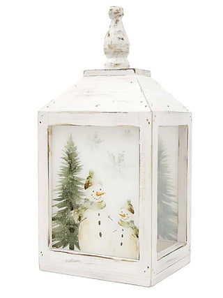 White wooden lantern with glass panels and snowy scene insert