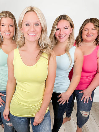 Women’s yellow, light blue, and pink V-neck scoop-neck reversible tank tops