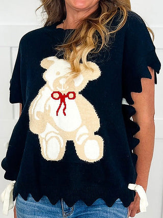 Black short-sleeve sweater top with large white bear graphic and red bow