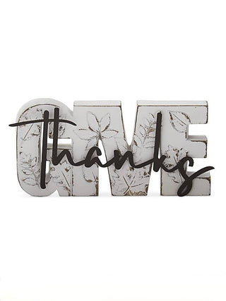 Resin harvest decor sign with “Thanks” in black script and leaf accents, distressed white.