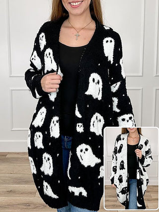 Reversible knit cardigan with white ghost motif pattern on black, long sleeves, open front