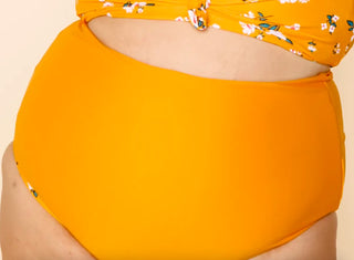 Reversible ultra high-rise swim bottoms in solid orange
