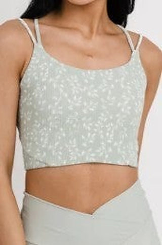 Light blue speckled crop swim top with thin straps and underbust band