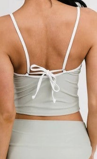 Light gray swim crop tank back with lace-tie detail and thin spaghetti straps