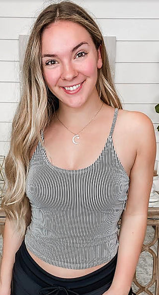 Gray-and-white striped swim tank with scoop neckline and thin shoulder straps