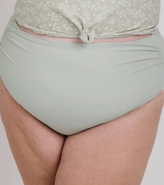 High-rise swim bottom in sage green with ruched waist and tie-front top detail