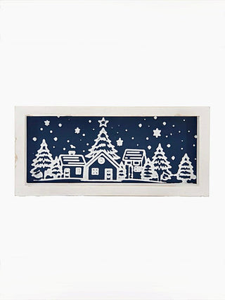 White framed wood village sign with snowy trees, houses, and starry night graphic