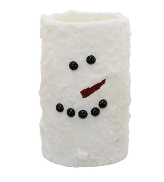 Snowman pillar candle front view with black bead face and red curved mouth