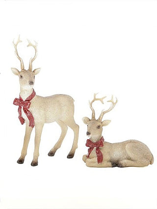 Resin deer decor set with standing doe and lying fawn, both with red bows