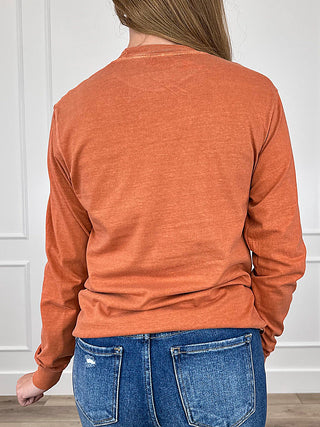 Orange cotton long-sleeve tee, back view with plain fabric and crew neckline