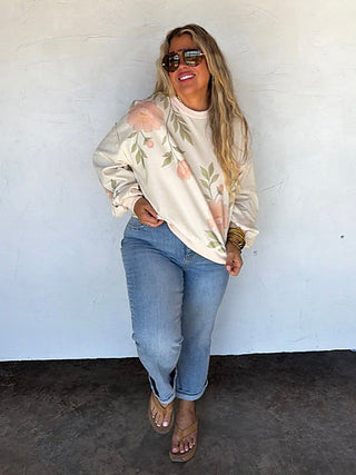 Cream floral long-sleeve pullover top, relaxed fit