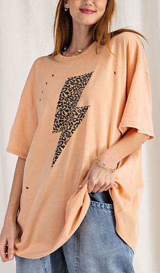 Peach oversized cotton graphic top with leopard lightning bolt and short sleeves