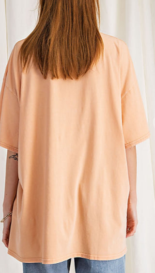 Peach oversized graphic T-shirt with leopard lightning bolt, back view, short sleeves