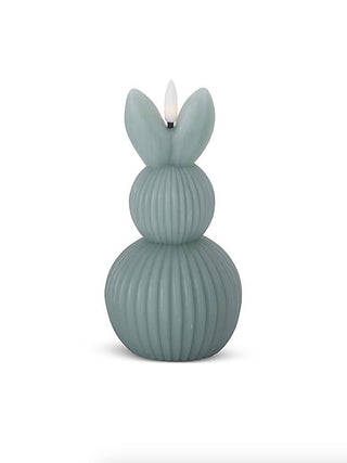 Green ribbed Easter bunny LED candle with lit wick-style LED and two ears