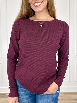 Plum knit long-sleeve crewneck sweater with relaxed fit