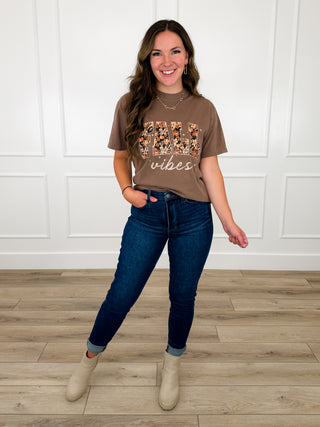 Brown Fall Vibes floral graphic tee styled with dark wash skinny jeans and cream suede booties.