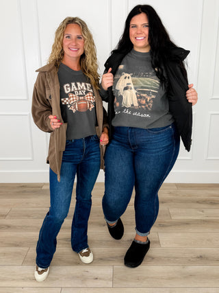 Two grey graphic tees, a ghost football print and a Game Day bow print, worn with dark wash jeans and layers.