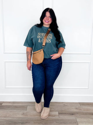 Green Surviving on Caffeine and Chaos graphic tee paired with Judy Blue Kyla skinny jeans.