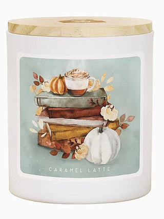 Soy candle with wooden lid; “Caramel Latte” stack books with pumpkin and leaves label