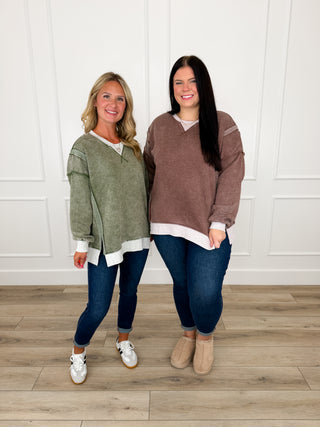 Olive and brown weekender tops paired with Judy Blue Kyla skinny jeans and sneakers or booties.