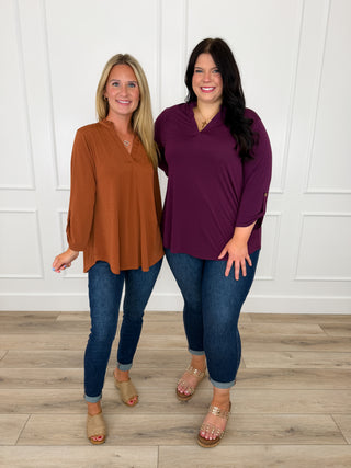 Dear Scarlett Gabby top shown in rust and plum with Judy Blue Kyla skinny jeans and wedge sandals.
