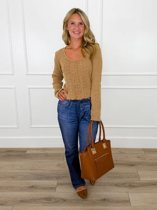 Tan cropped lace-trim top with dark wash straight leg jeans and cognac mules.