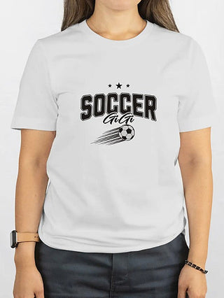 White cotton-blend short-sleeve graphic tee with “SOCCER Gigi” and soccer ball