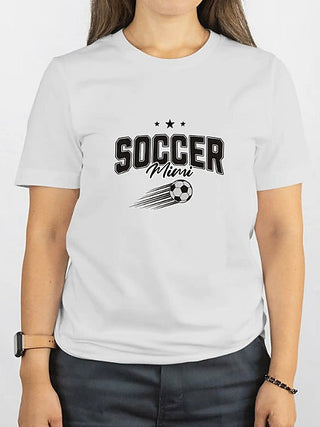 White cotton-blend short-sleeve graphic tee with “SOCCER Mimi” and soccer ball