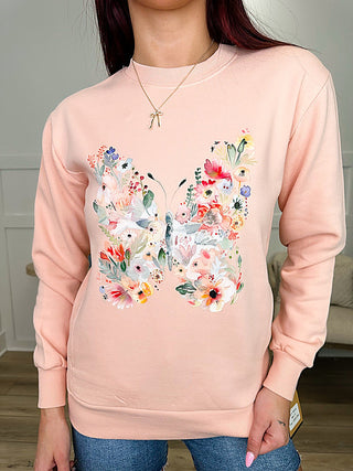 Pink long-sleeve crewneck sweatshirt with colorful floral butterfly front graphic