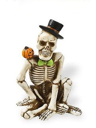 Resin skeleton decor figurine with black top hat, orange jack-o'-lantern, seated