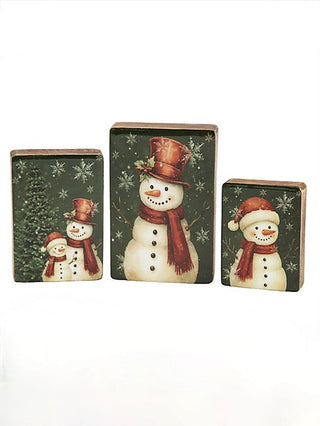 Green wood block decor set of three with stacked snowman faces in winter hats