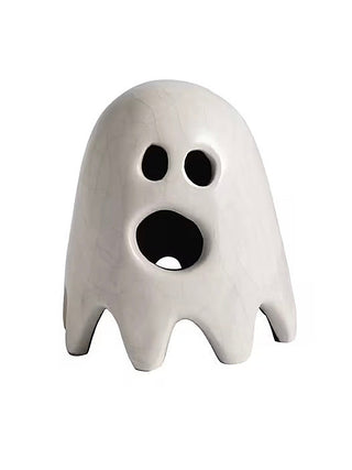 Ceramic ghost figurine, white with black eyes and large paw-like mouth