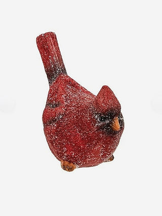 Glittered red resin bird figurine, angled view with one wing raised