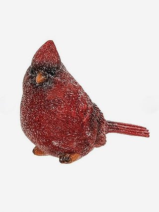 Glittered red resin bird figurine, front-left view with long tail and beak