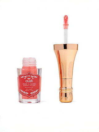 Glossy lip gloss bottle with rose-gold cap plus applicator wand with pink gloss