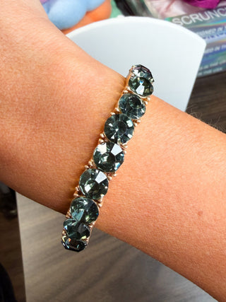 Green rhinestone bracelet with gold-tone bezel links