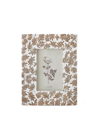 Wood picture frame with white mat, leaf pattern border, and botanical photo card