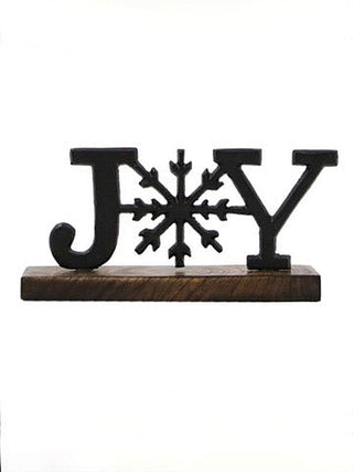 Black metal "JOY" holiday tabletop decor with snowflake on wood base