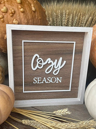 Reversible wood holiday sign with “Joy” and “SEASON” on a dark brown side