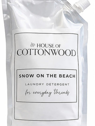 Snow on the Beach laundry detergent refill pouch, white bag with screw cap