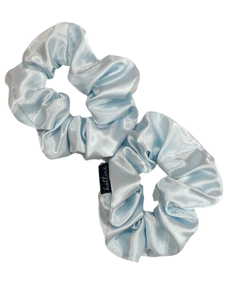 Silver blue satin scrunchie with gathered, ruffled texture