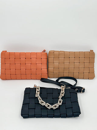 Woven faux leather shoulder bag with chain strap, orange, tan, and dark navy