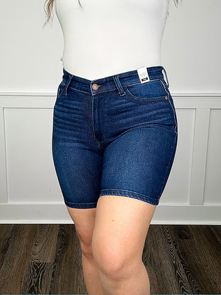 High-rise dark wash denim bermuda shorts, button fly, back pockets
