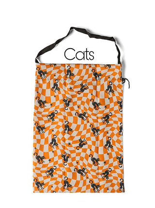 Halloween candy bag with cats pattern and orange checker backdrop with black handles