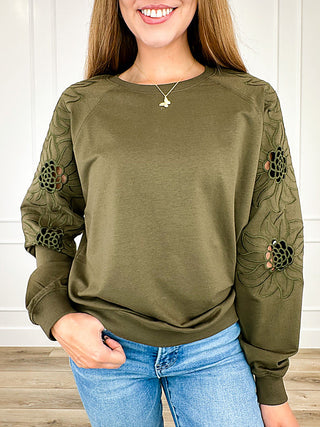 Avery Mae long sleeve top in olive green with floral embroidered sleeves