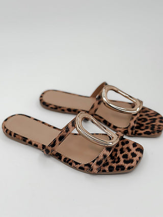 Leopard print faux leather slide sandals with two metal buckle straps