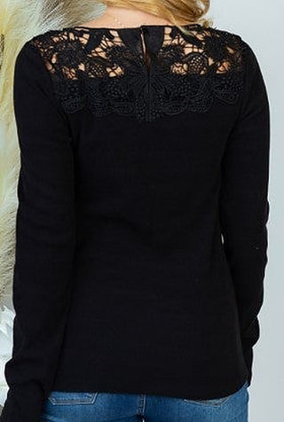 Black ribbed long-sleeve top with lace back yoke and center keyhole detail
