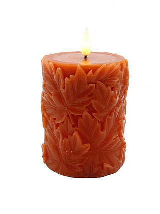 Amber orange LED pillar candle with leaf embossing and glowing flame