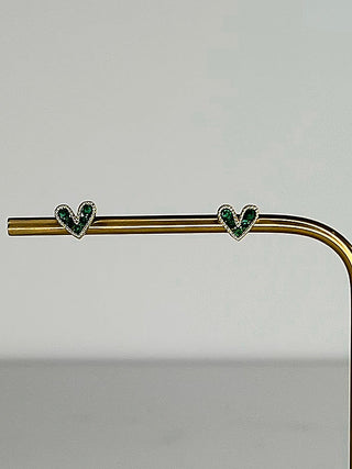 Gold-tone heart stud earrings with green crystals on a straight bar