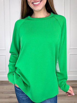 Kelly green ribbed long sleeve weekender top with crew neck and raglan sleeves